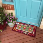 a coir doormat on a porch