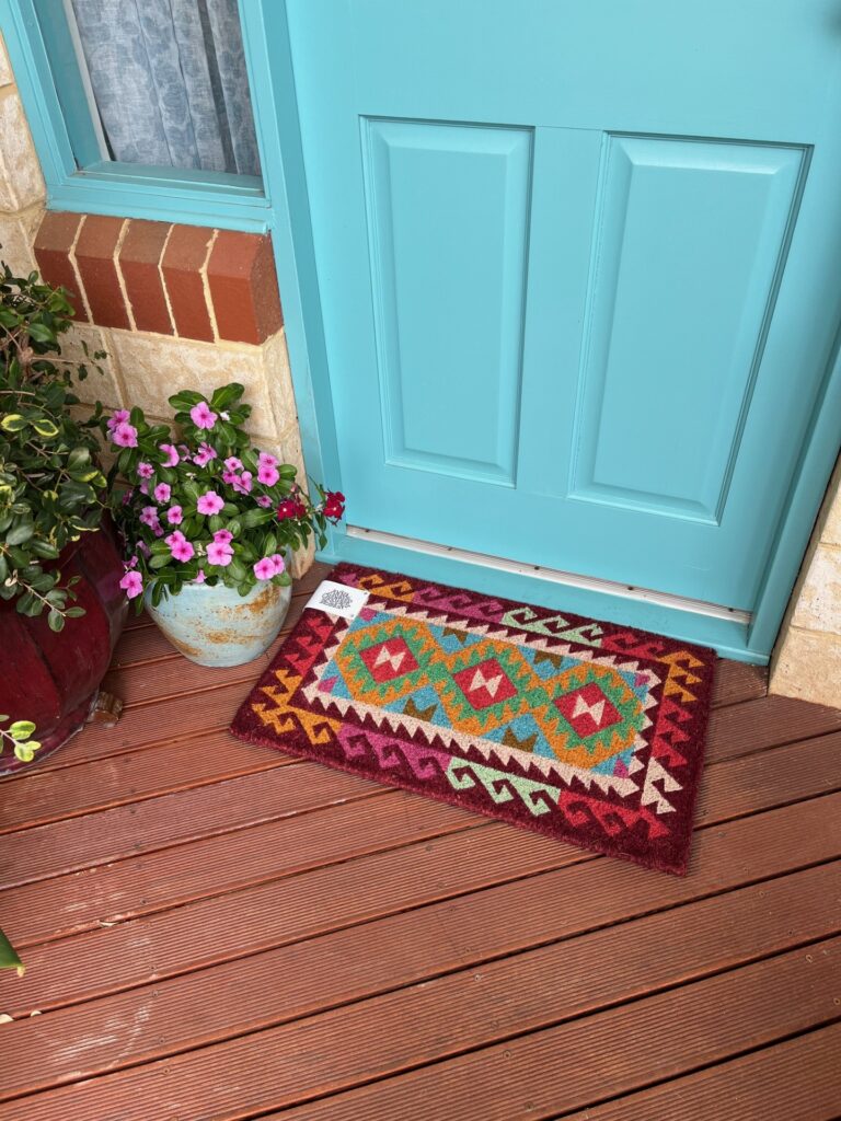 a coir doormat on a porch