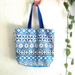 a blue and white bag